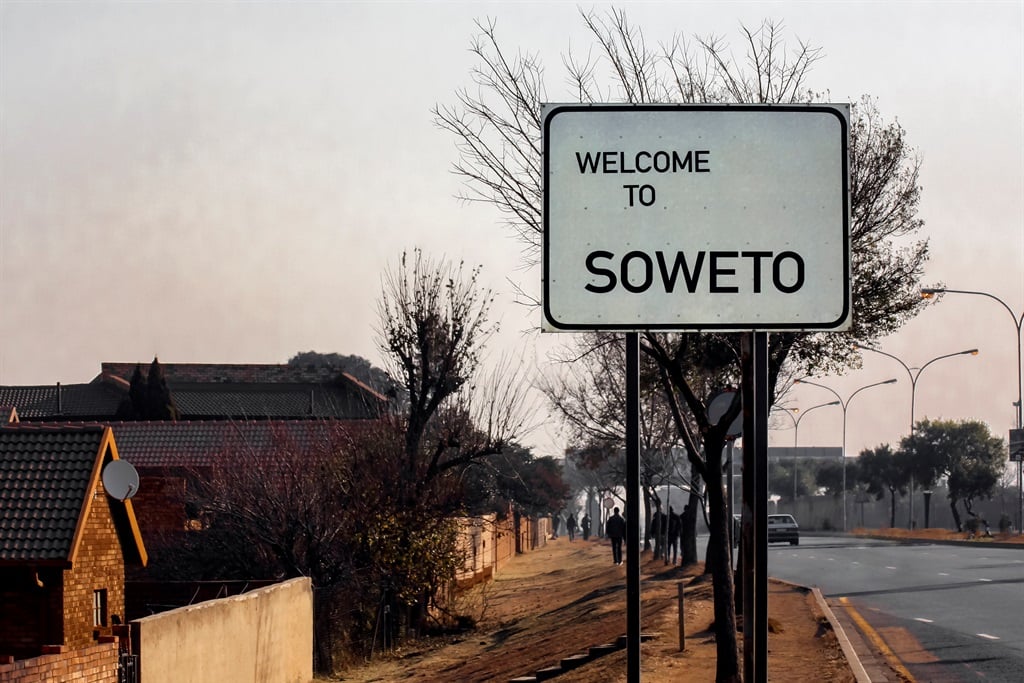 A road sign welcoming people to Soweto at the entrance of South Africa's biggest township, SOWETO.