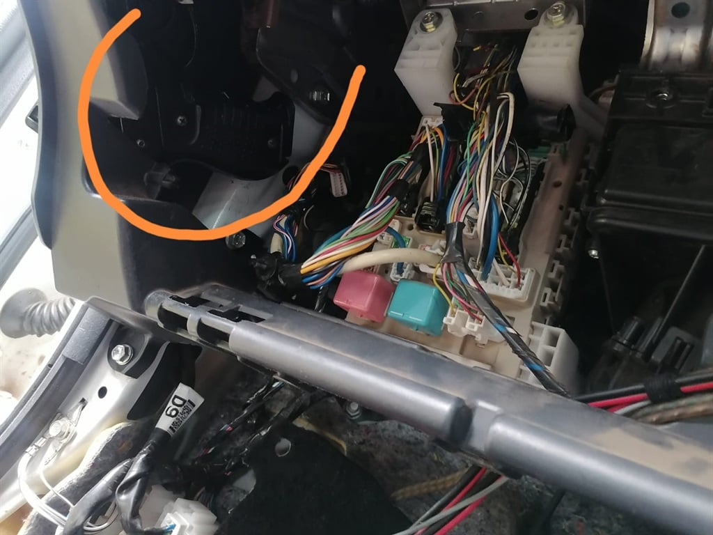 Compartment in car where guns and ammo were found