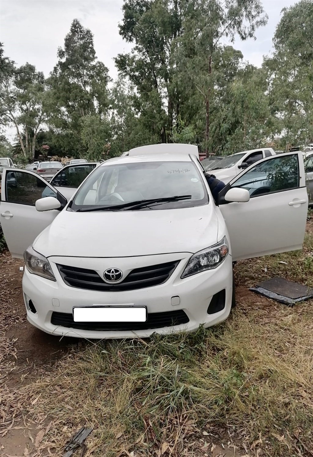 White Toyota in which stash of firearms was found