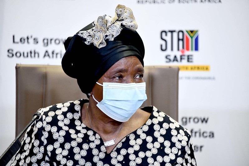 Minister of Cooperative Governance and Traditional Affairs, Nkosazana Dlamini Zuma, during one of her many pandemic-response  press conferences. (GCIS)