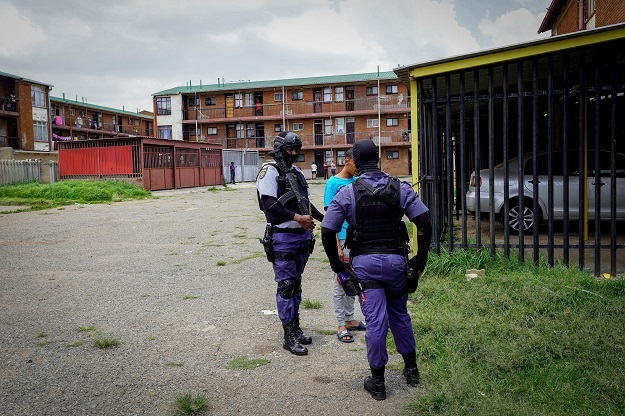 SAPS Anti-Gang Unit members conduct stop and search operations at the notorious "B-flats" in Eldorado Park.